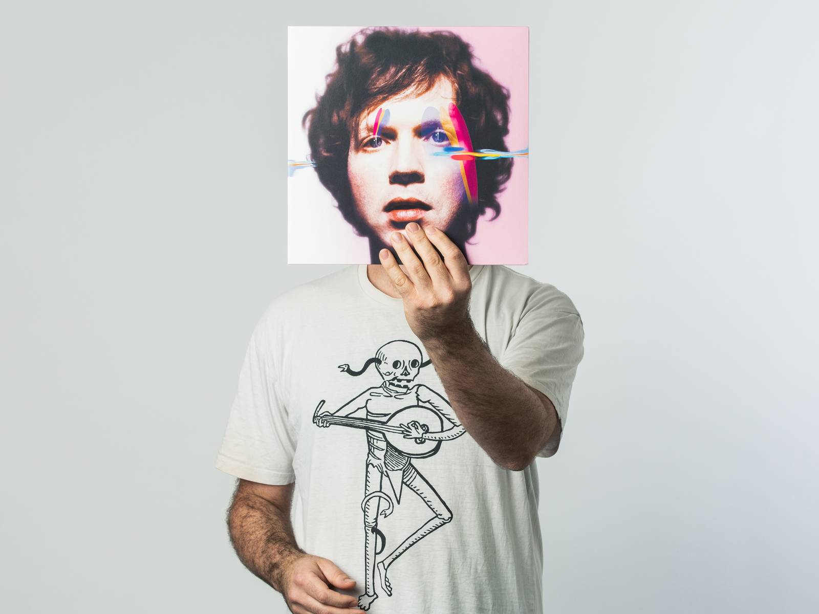 Joe holding a Beck album