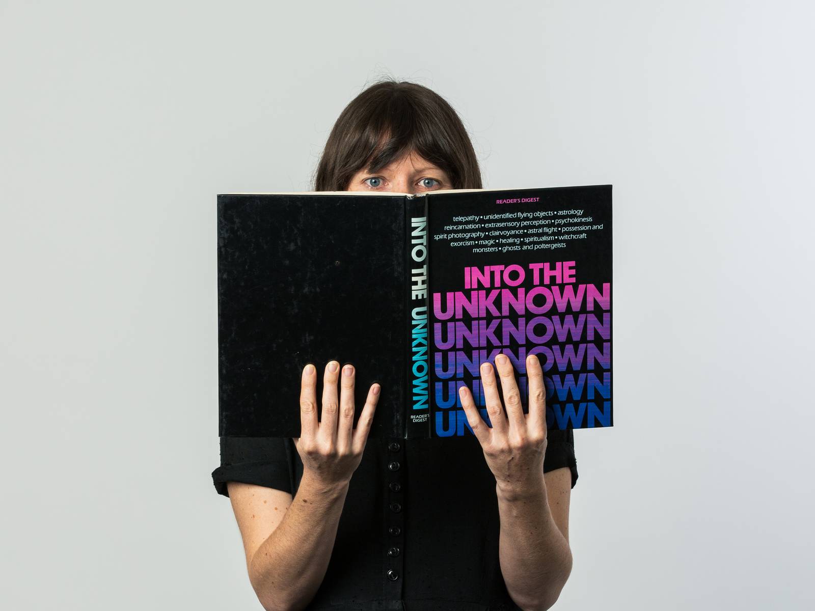 Lizy reading 'Into The Unknown' book