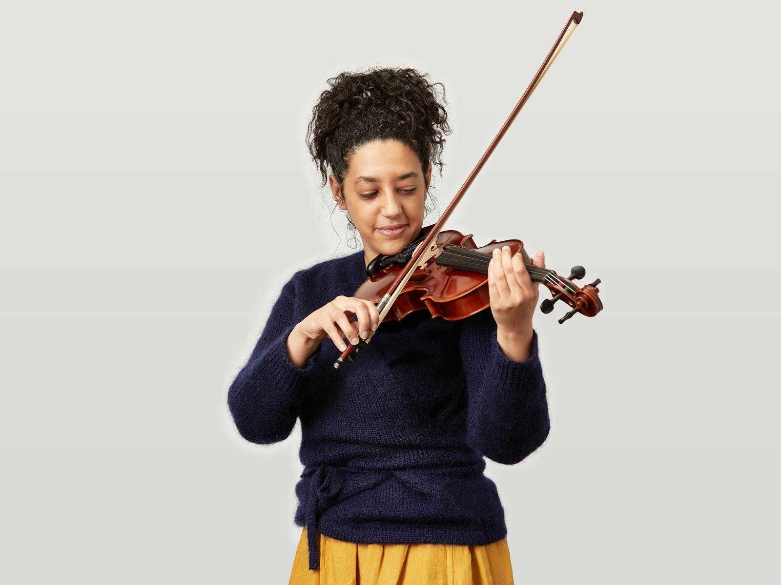 Melissa playing a violin.jpg